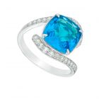 10K White Gold Cushion-Cut Blue Topaz and 3/8 CT. T.W. Diamond Bypass Ring