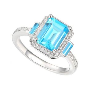 Sterling Silver Blue Topaz and 1/6 CT. T.W. Diamond Ring 